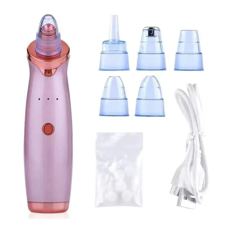 Rose gold blackhead vacuum device with five suction heads, USB cable, and accessories.